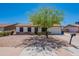 Charming single-story home featuring a well-manicured front yard, desert landscaping, and inviting curb appeal at 215 S 132Nd St, Chandler, AZ 85225