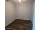 Bright bedroom with hardwood floors; ready to be personalized and made into a relaxing space at 2367 E Huntington Dr, Phoenix, AZ 85040