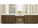 Bathroom with double vanity, wood cabinets and ample counter space at 24647 N 164Th Dr, Surprise, AZ 85387
