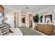 Well-lit bedroom features a spacious closet, a dresser with mirror, and stylish decor elements at 24649 N 164Th Dr, Surprise, AZ 85387