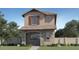 Charming two-story home with stone accents, a gable roof, and an inviting front porch at 24649 N 164Th Dr, Surprise, AZ 85387