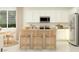 Modern kitchen with a large island featuring barstool seating, stainless steel appliances, and natural light at 25004 N 174Th Ave, Surprise, AZ 85387