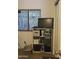Bedroom featuring a storage shelf unit and a window with natural light at 300 S Val Vista Dr # 54, Mesa, AZ 85204