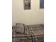 Relaxing bedroom showcasing a comfortable bed and decorative wall art at 300 S Val Vista Dr # 54, Mesa, AZ 85204