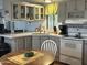 Bright kitchen with ample counter space and classic white appliances at 300 S Val Vista Dr # 54, Mesa, AZ 85204