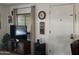Inviting living room featuring stylish decor and a convenient entryway door at 300 S Val Vista Dr # 54, Mesa, AZ 85204