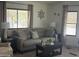 Comfortable living room featuring a neutral color scheme and a decorative wall design at 300 S Val Vista Dr # 54, Mesa, AZ 85204