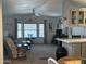 Spacious open-concept living area flowing into the kitchen with ample natural light at 300 S Val Vista Dr # 54, Mesa, AZ 85204