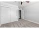 Spacious bedroom with carpet, closet, and ceiling fan offers a comfortable retreat at 3126 W Stella Ln, Phoenix, AZ 85017