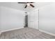 Spacious bedroom with carpet, closet, and ceiling fan offers a comfortable retreat at 3126 W Stella Ln, Phoenix, AZ 85017