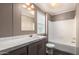 Clean bathroom with a modern vanity, shower, and bright lighting at 320 E Mckellips Rd # 45, Mesa, AZ 85201