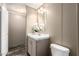 Well-lit bathroom with a sleek vanity, mirror, and efficient fixtures at 320 E Mckellips Rd # 45, Mesa, AZ 85201