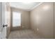Cozy bedroom with plush carpeting and a window, offering a blank canvas at 320 E Mckellips Rd # 45, Mesa, AZ 85201