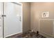 Entryway with durable flooring, a sturdy exterior door, and utility connections at 320 E Mckellips Rd # 45, Mesa, AZ 85201
