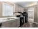 Functional kitchen with modern appliances, countertops, and cabinetry at 320 E Mckellips Rd # 45, Mesa, AZ 85201