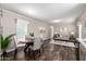 Open living area featuring a kitchen, dining space, and a cozy living room setup at 320 E Mckellips Rd # 45, Mesa, AZ 85201