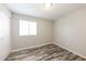 Bedroom with hardwood floors and closet at 4833 N 63Rd Ln, Phoenix, AZ 85033