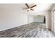Bright bedroom with hardwood floors and a mirrored closet at 4833 N 63Rd Ln, Phoenix, AZ 85033