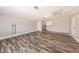 Spacious garage with wood flooring, utility connections, and ample storage space at 4833 N 63Rd Ln, Phoenix, AZ 85033