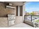 Balcony features a stainless steel gas grill with storage, great for entertaining at 5250 E Deer Valley Dr # 140, Phoenix, AZ 85054