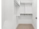 Spacious walk-in closet with multiple shelves and racks for optimal organization at 5250 E Deer Valley Dr # 140, Phoenix, AZ 85054