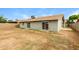 Spacious backyard with block wall and access from multiple rooms at 5533 W Sunnyside Dr, Glendale, AZ 85304