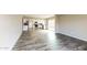 Open living space featuring stylish floors that seamlessly connect the living room and kitchen at 5533 W Sunnyside Dr, Glendale, AZ 85304