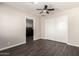 Neutral bedroom with wood floors, large closet and bright lighting at 6022 E Colby St, Mesa, AZ 85205