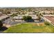 An aerial view of a well-planned community with manicured lawns and tree-lined streets at 64 N 63Rd N St # 33, Mesa, AZ 85205