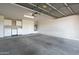 Spacious garage with laundry area and ample storage space, ensuring functionality at 64 N 63Rd N St # 33, Mesa, AZ 85205