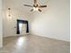 Spacious living room with vaulted ceilings, modern light fixtures, and neutral walls at 64 N 63Rd N St # 33, Mesa, AZ 85205