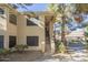 Inviting condo exterior featuring well-maintained landscaping, private entry stairs, and natural light at 6885 E Cochise Rd # 219, Paradise Valley, AZ 85253