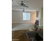Open-concept living room with a fireplace at 7052 E Kessler Ave, Mesa, AZ 85209