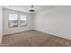Bedroom with large windows offering plenty of natural light and carpet at 7413 S 32Nd Dr, Phoenix, AZ 85041
