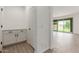 Hallway that showcases the storage and access to the back yard at 7413 S 32Nd Dr, Phoenix, AZ 85041