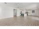 Open living space featuring recessed lighting and an open transition to the kitchen at 7413 S 32Nd Dr, Phoenix, AZ 85041
