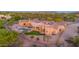 Beautiful custom home with a backyard pool and spiral staircase set in a tranquil desert environment at 8024 E Lone Mountain Rd, Scottsdale, AZ 85266