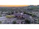 Beautiful home with porte cochere and lush landscaping nestled in a serene desert setting with majestic mountain views at 8024 E Lone Mountain Rd, Scottsdale, AZ 85266
