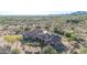 Custom home with a tile roof featuring a pool and patio nestled in desert landscape at 8024 E Lone Mountain Rd, Scottsdale, AZ 85266