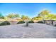 Spacious backyard area featuring decorative landscaping and desert views at 8024 E Lone Mountain Rd, Scottsdale, AZ 85266