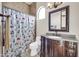 Bathroom featuring a vanity with a dark wooden cabinet and granite countertop at 8024 E Lone Mountain Rd, Scottsdale, AZ 85266