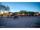 Desert home featuring mature trees and native vegetation, showcasing a tranquil and private setting at 8024 E Lone Mountain Rd, Scottsdale, AZ 85266