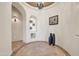 Elegant foyer with recessed lighting, custom tile flooring, and arched doorways at 8024 E Lone Mountain Rd, Scottsdale, AZ 85266