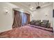 Home theater featuring leather seating, projector, and sound system for entertainment at 8024 E Lone Mountain Rd, Scottsdale, AZ 85266