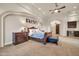Luxurious main bedroom featuring elegant furnishings and a built-in bar area at 8024 E Lone Mountain Rd, Scottsdale, AZ 85266