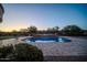 Private pool and spa surrounded by lush landscaping, creating a serene outdoor retreat at 8024 E Lone Mountain Rd, Scottsdale, AZ 85266