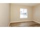 An airy room with light-colored walls and natural light, plus wood-look floors at 9622 N 35Th Ln, Phoenix, AZ 85051