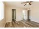A bright bedroom is shown, complete with ceiling fan and an ensuite bathroom at 9622 N 35Th Ln, Phoenix, AZ 85051