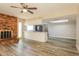 Open concept kitchen flows to the living room and features stainless steel appliances at 9622 N 35Th Ln, Phoenix, AZ 85051
