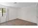 Neutral bedroom with large window to let in natural light and plush carpeting at 9797 N 100Th Pl, Scottsdale, AZ 85258